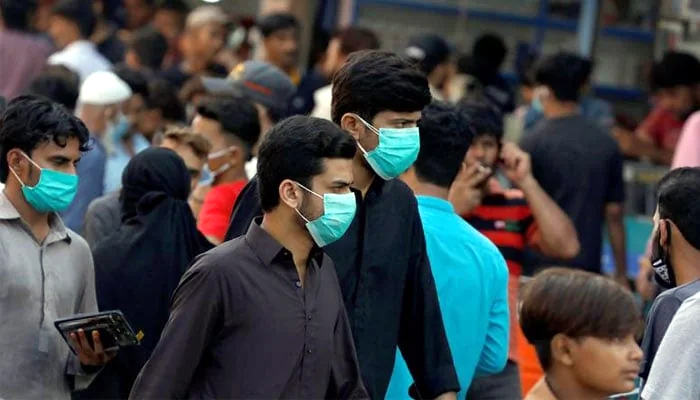 Karachi residents advised to mask up in crowded spaces amid surge in flu cases